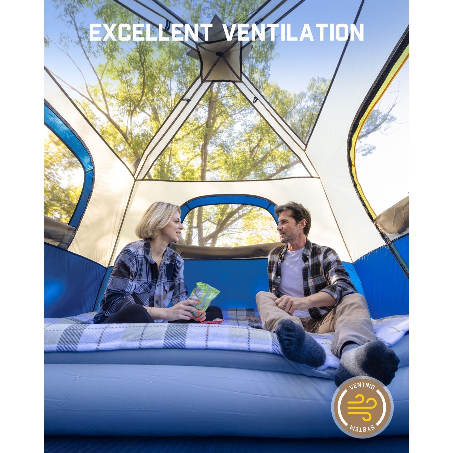 Couple relaxing inside FanttikOutdoor Zeta C6 Pro camping tent with excellent ventilation and venting system.