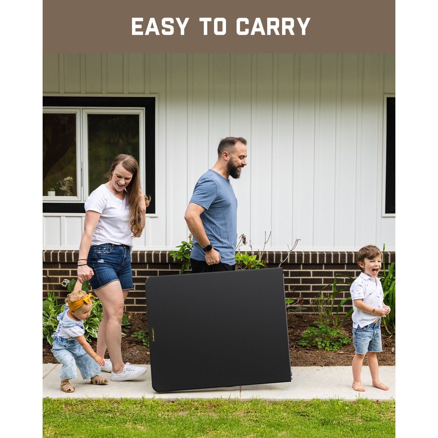 Family carrying folded FanttikOutdoor Zeta X6 Pro 6ft folding table, easy to carry