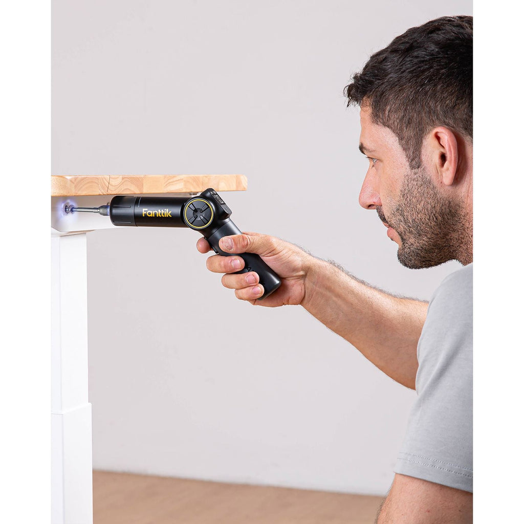 Fanttik Fold S1 APEX Deluxe Cordless Screwdriver in use, with adjustable torque and LED display.